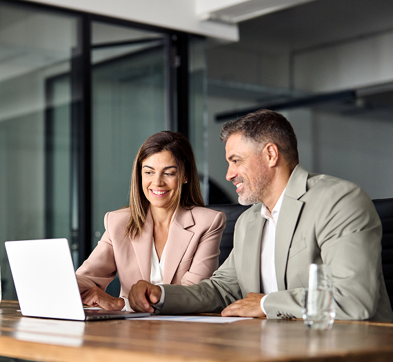 Insurance broker explaining personal and business insurance cover options to clients.