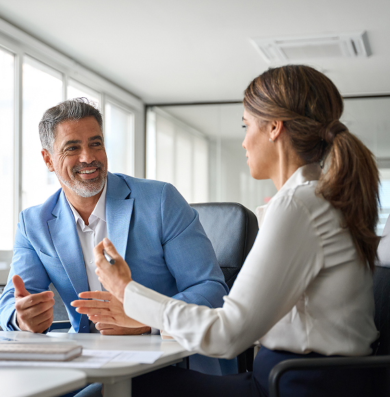 Insurance broker discussing tailored business insurance solutions with a client during a consultation in Perth.